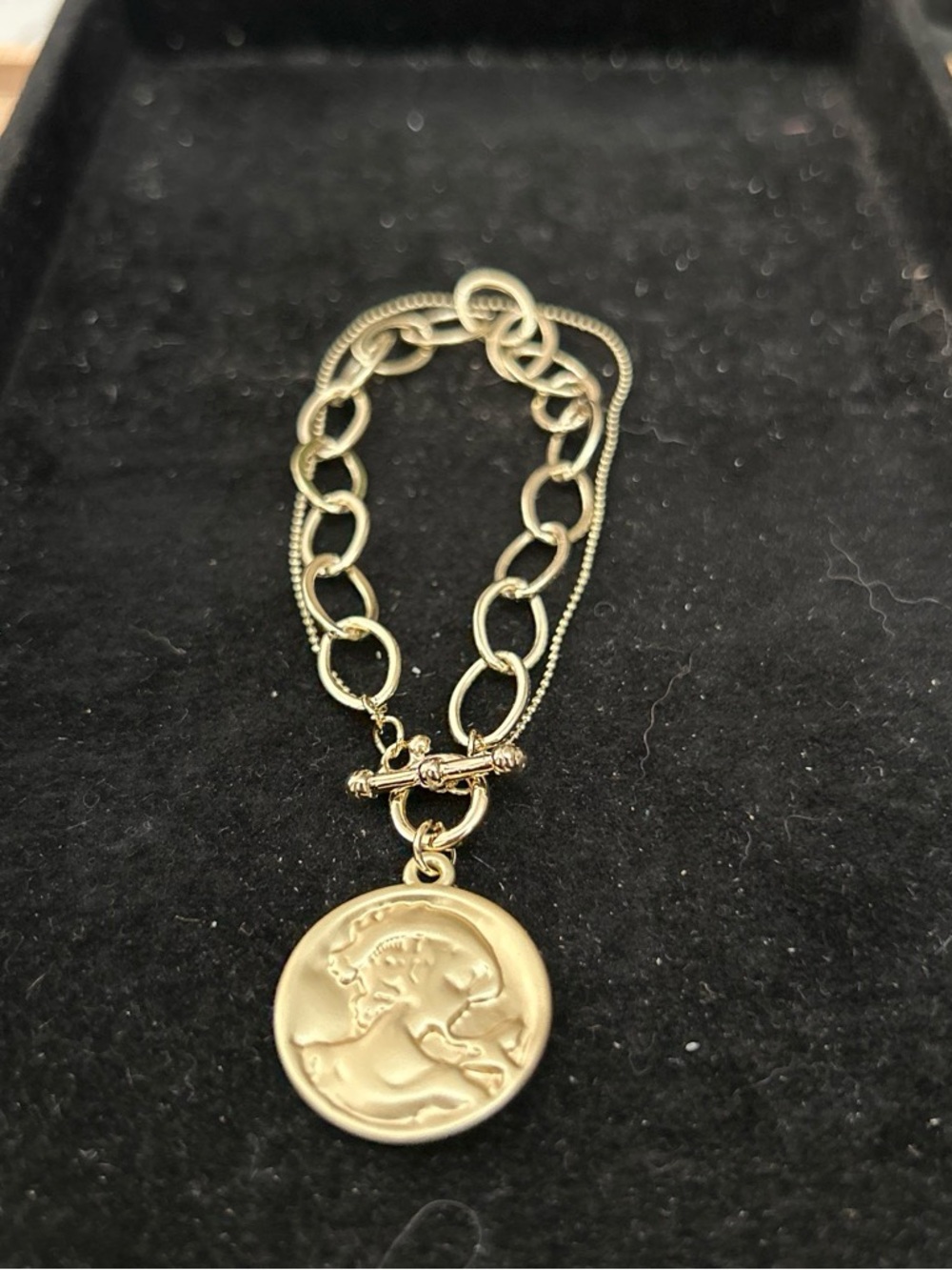 Gold color coin bracelet around 6.5” wrist